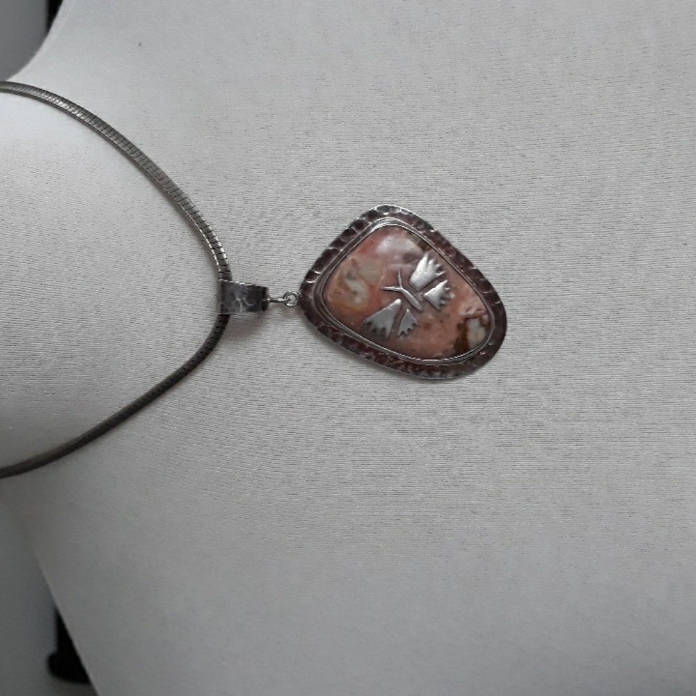 NWOT SS 925°statement pendant.